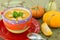 Pumpkin soup in colorful bowl