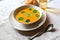 Pumpkin soup with green leaf