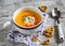 Pumpkin soup with paprika and cream and crackers