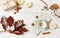 Pumpkin spice latte. Coffee top view on white wood background