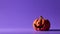 Pumpkin on a violet background, Halloween backdrop