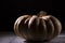 Pumpkin on a wooden table black background side view. Halloween background with pumpkin