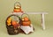 Pumpkins and Apples in Baskets on Wood Bench