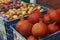 Pumpkins and apples in crates