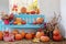 Pumpkins, apples, flowers in old room