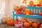 Pumpkins on blue wooden bench indoor