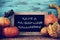 Pumpkins and chalkboard with text have a fa-boo-lous halloween