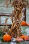 Pumpkins, cornstalks, fence and snow in a Wisconsin autumn