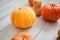 Pumpkins on the floor in the room