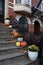 Pumpkins and Flower Pots on the Stairs of an Old Brownstone Home in Prospect Heights Brooklyn during Autumn