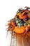 Pumpkins, gourds, and leaves in an Autumn cornucopia