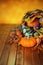 Pumpkins, gourds, and leaves in an Autumn cornucopia