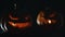 Pumpkins Jack o lantern face with lights and smoke for Halloween night