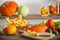 Pumpkins and other vegetables on wooden table