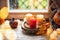 Pumpkins on the sill window, rainy weather outside. Autumn seasonal decor