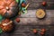 Pumpkins and soup with seeds and ground cherry on wooden table