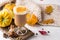 Pumpkins spice latte with pumpkins Copy space. Pumpkin latte - cozy drink for fall or winter