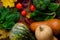 Pumpkins, spinach and broccoli on wooden background. Selective focus. Healthy eating