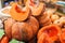 Pumpkins on a stall at organic farmers grocery store. Ripe cut i