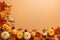 Pumpkins, star anises, pine cone and maple leaves on brown background, top view, Thanksgiving and Halloween autumn background