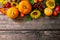 Pumpkins, sunflowers, apples and fallen leaves. Top view flat lay. Copy space