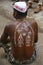 PUNE, MAHARASHTRA, INDIA, June 2017, Man shows his painted back during Pandharpur festival