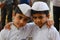 PUNE, MAHARASHTRA, INDIA, June 2017, Two young boys with white caps and kurtas during Pandharpur festival