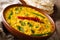 Punjabi recipe Dal Tadka vegetarian yellow lentils with spices s