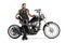 Punk biker sitting on a chopper motorbike