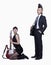 Punk girl with guitar and serious punk businessman, studio shot