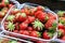 Punnet of organic strawberries