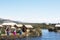 PUNO, PERU - MAY 14, 2015: Unidentified women in traditional dresses welcome tourists in Uros Island