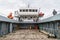 PUNTA ARENAS, CHILE - MARCH 4, 2015: Ferry Melinka leaving Penguin colony on Isla Magdalena island in Magellan Strait