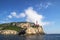 Punta Carena Lighthouse on the coastal rocks in Capri island