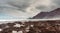 Punta del Hidalgo, Tenerife, Espania - October 27, 2018: Panorama of the rocky beach of Punta de Hidalgo and the waves breaking at