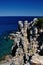 Punta Faraglione ocean view with rocky cliffs, Giglio Island, Italy