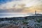 Punta Sottile lighthouse silhouette at sunset, Favignana, Aegadian Islands, Sicily