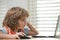 Pupil schoolkid studying homework math during lesson at classroom, education concept, Cute schooler.