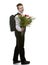 The pupil of the senior classes in a school uniform with a bouquet of flowers