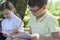 Pupils boy and girl are engaged in an outdoor lesson