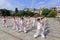 Pupils practice to play traditional martial arts at the school square