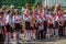 Pupils of primary school at the party of ending of the school year. Smiling and happiness children.