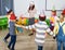 Pupils with teacher dancing during festive event