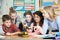 Pupils And Teacher In Science Lesson Studying Robotics