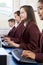 Pupils Wearing School Uniform In Computer Class