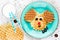 Puppy dog waffles for baby breakfast. Animal-shaped adorable art