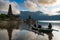 Pura ulun danu bratan temple with tourist on local boat admiring view of the temple. Travel destination