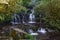 Purakaunui Falls, New Zealand. Slow shutter speed smoothes fall