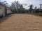 PURBALINGGA 11 Oktober 2021-A man spreads rice on a road to dry it in the sun during rice harvest in a vast yard