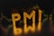 Purchasing Managers Indexes - pmi  sign in gold letters on the background of a chart of oil from the Forex market